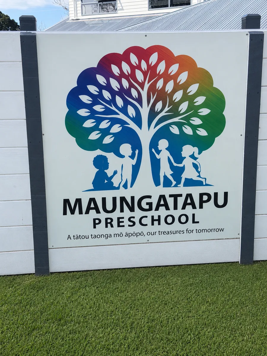 The Maungatapu Preschool entrance sign showing the tree and children logo